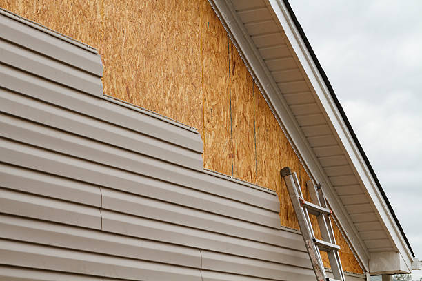Professional Emergency Siding Repair technician working in Strasburg, CO